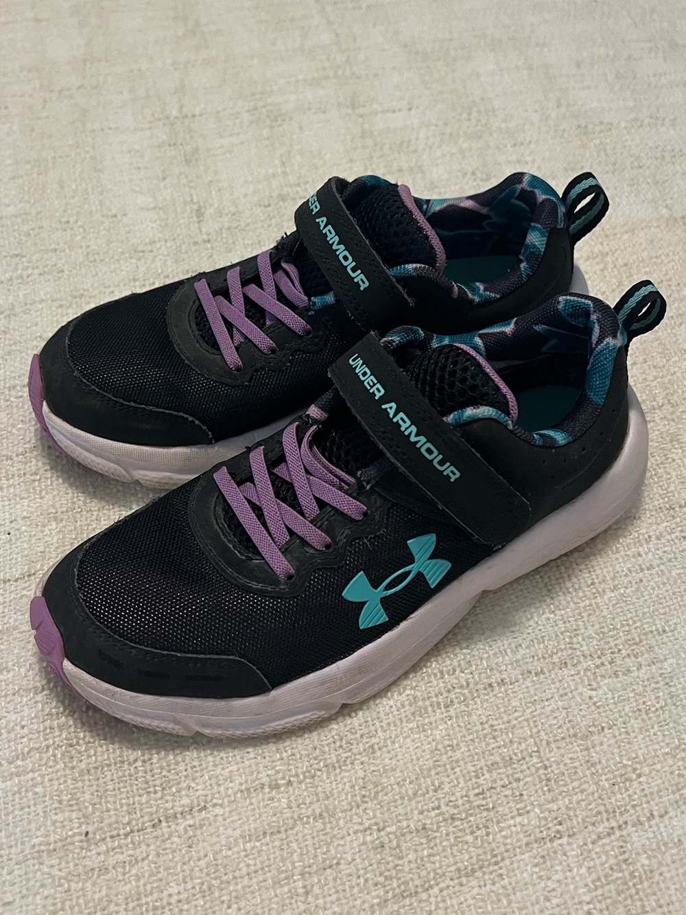 EUC: Under Armour Black Sneakers with Teal Logo and Purple Laces size 3 Youth